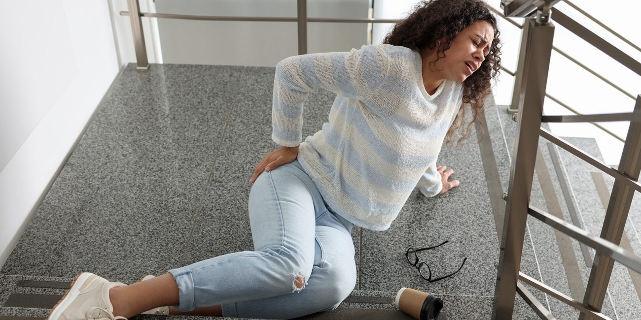 Premises Liability Slip and Fall Accident with Woman on a Staircase